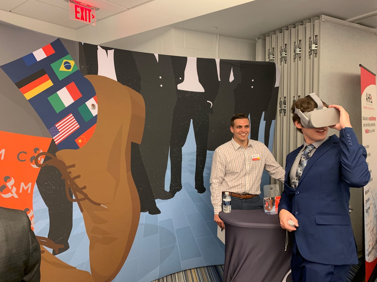 A student trying a VR experience at a Clayton & McKervey campus recruiting event